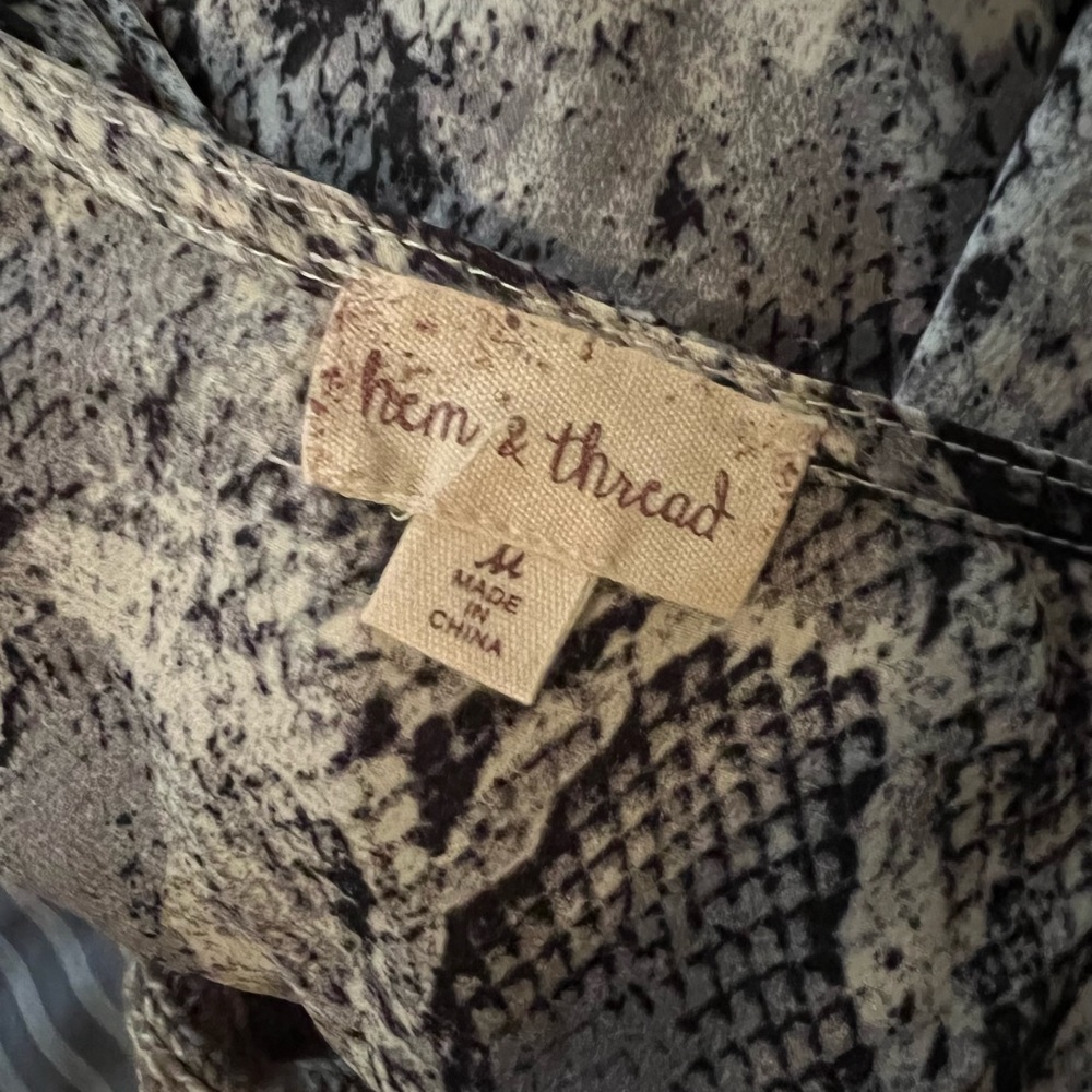 Hem & Thread peplum snakeskin blouse